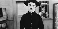 Charlie Chaplin nel film Il Pellegrino del 1923