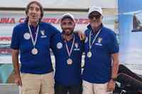 I tre partecipanti alla gara di pesca di Traina costiera e Campioni d'Italia